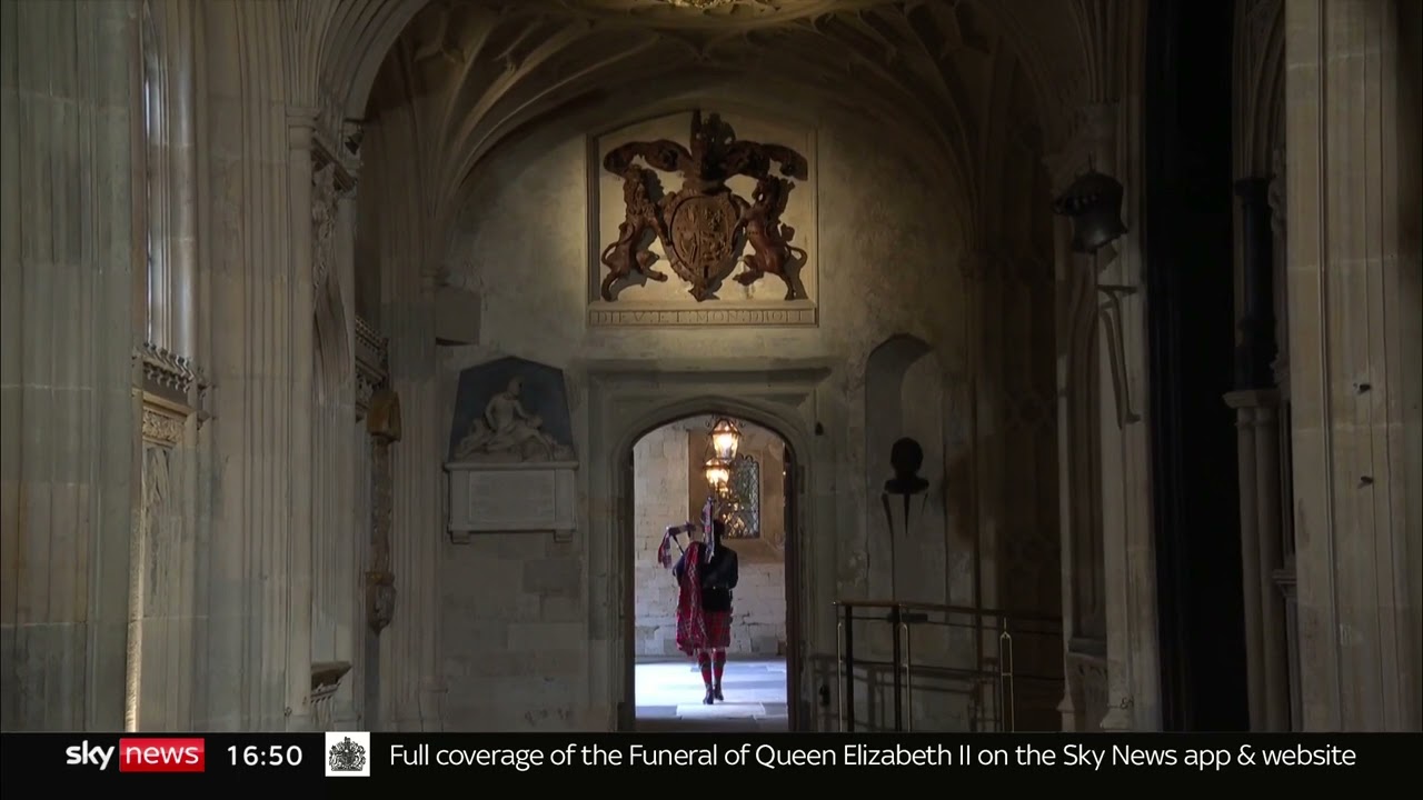 Queen Elizabeth lowered into Royal Vault as lone piper concludes state funeral