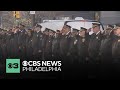 Philadelphia police escort body of Officer Andy Chan to headquarters