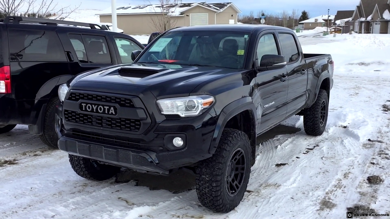 Lifted 2017 Toyota Tacoma with a TRD Pro Grill on 275/70R17 Tires in