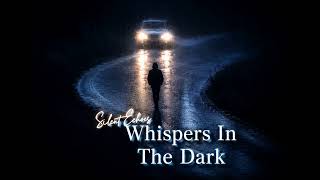 WHISPERS IN THE DARK