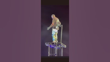 Thumbnail of travis scott dancing while people are dying