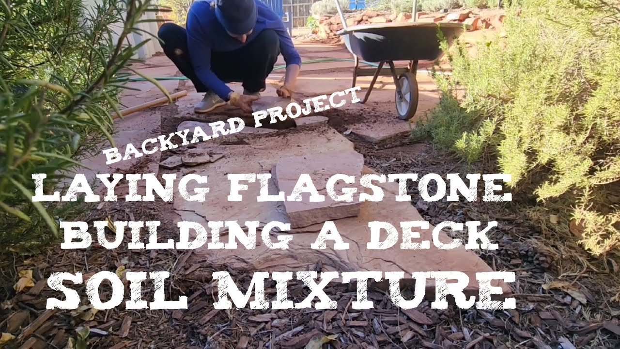 Progress on the Backyard Project Laying Flagstone Building a deck woodworking project