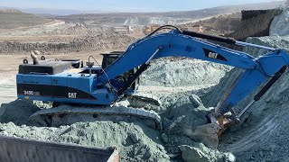 Caterpillar 345C Excavator Loading Trucks