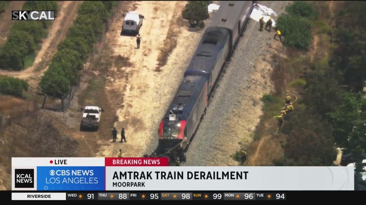 Amtrak train partly derails after colliding with truck - YouTube