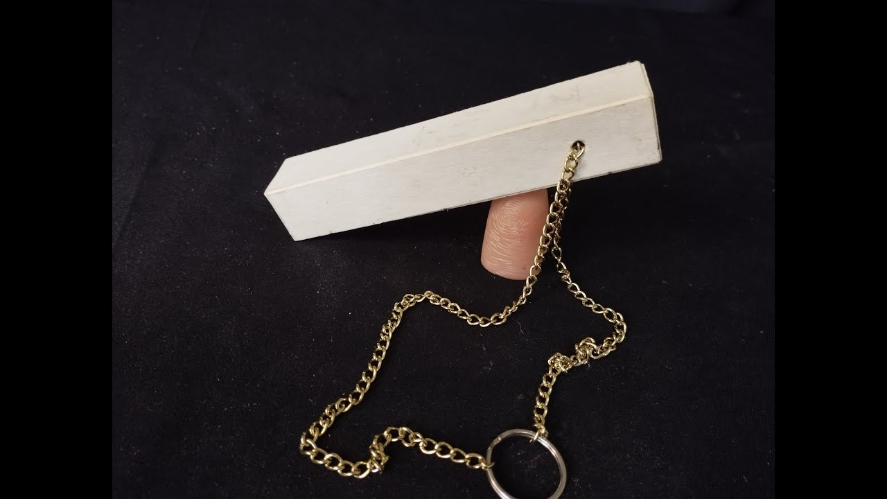 Moving chain magic trick revealed & how to make. - YouTube