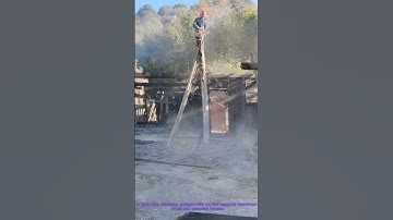 Old House Demolition: Workers Hand-Remove Wooden Beams Safely