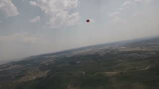 Drone Following Frisbee Off Mountain