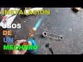 Instalación y usos de un mechero con su cilindro de gas propano.