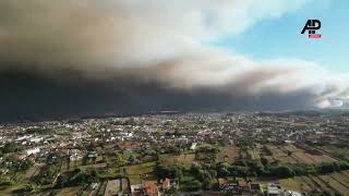 Drone captures smoke cloud blanketing Portugal’s Aveiro district as multiple fires rage
