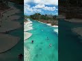 ✨🏝️ **Bacalar, a Lagoa das 7 Cores no México!** 🇲🇽✨ Águas cristalinas, natureza exuberante
