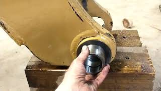 Line boring and machining bushings for a Cat 416 backhoe