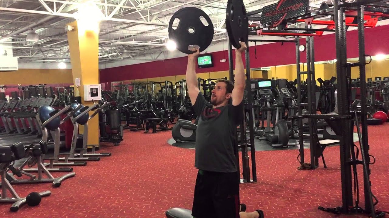 Kneeling Bottoms-Up Overhead Plate Press