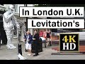 London England, Street performer, Levitation Construction Worker, Silver Man "razzamatazed"