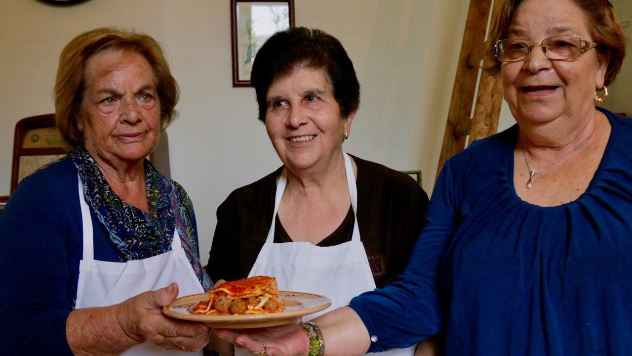 Pasta Grannies cook 'sagna al forno' with meatballs YouTube