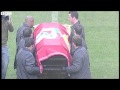 Eusebio coffin carried around stadium