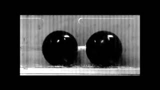 Self-propulsion of a grain-filled dimer in a vertically vibrated channel screenshot 4