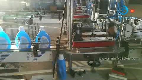 Automatic laundry bottle pail drum liquid filling capping induction sealing machine testing video