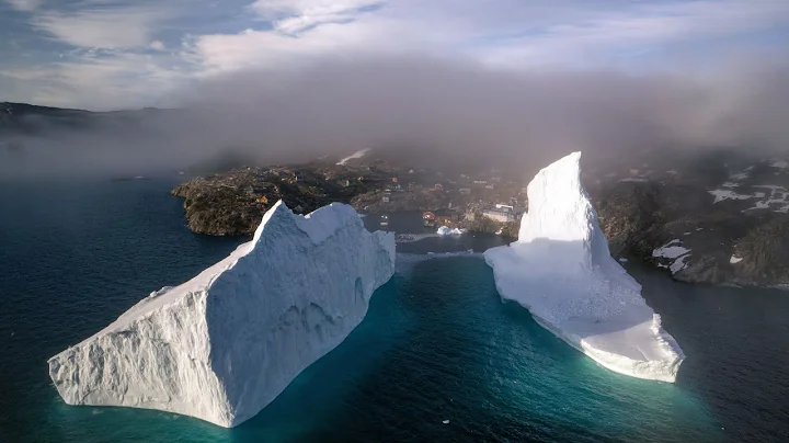 Incredible images show huge iceberg drifting dangerously close to shore | SWNS