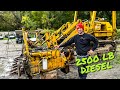 Pulling a 10.5 liter Caterpillar Diesel from a 977L Track Loader