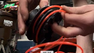 Restringing trimmer