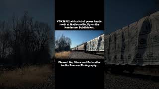 CSX M512 with a lot of power heads north at Madisonville, Ky on the Henderson Subdivision. CSX M512 with a lot of power heads north at Madisonville, Ky on the Henderson Subdivision.