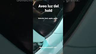 solución luz del hold Aveo.