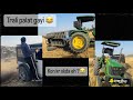 Troli palat gayi  kon kr skda eh stunt thar nal tochan palea   johndeere 