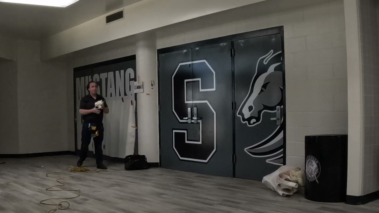 TM Signs and Graphics - High School Gym Vinyl Installation