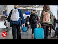 Live: Holiday travellers head off for Thanksgiving at DC's Reagan Airport