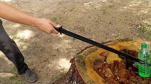 Slow Motion Stab Test - APOC Atrim Broad Sword into a Green Water Filled Bottle