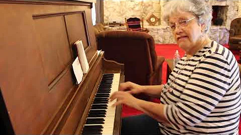 "I Was Made For Loving You," sung by Janet Schuler