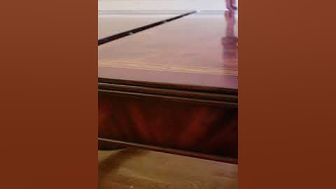 Expanding dining room table with self storing leaves.  Large 8 to 12 foot mahogany pedestal table