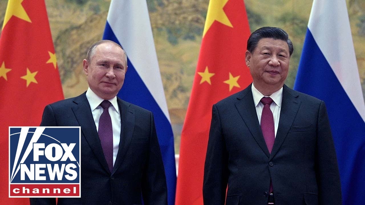 Xi hugs Putin as Russia-China talks sealed with rare show of affection