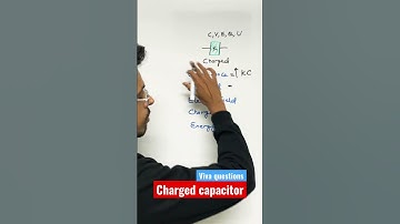 Energy of a Charged capacitor after inserting dielectric #physics