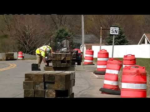 newspaper mockup County Highway OT closed for summer for repaving, roundabout