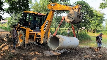 JCB Lifting Heavy Culvert Pipe and Installing in Drain - JCB Dozer Video