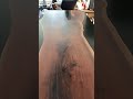 Blending deep black resin with natural wood, this table brings a warm, intimate vibe to every meal.