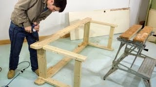 A workbench made from 2x4s and an old door, using a circular saw and a hand drill. http://woodgears.ca/workbench.