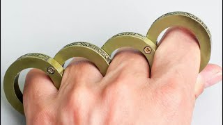 Folding self defense brass knuckle rings