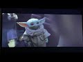 Baby Yoda follows Mando off ship
