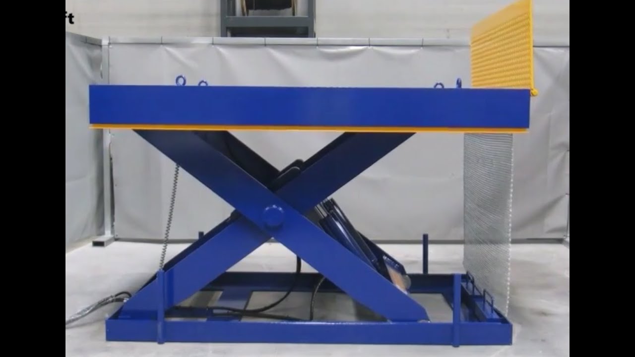 Electric scissor lift with auto lip and safety curtain YouTube