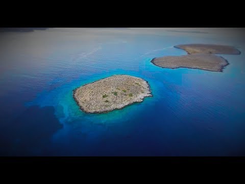 The Grandes islands and Hiona beach in Crete / 4k UHD drone footage