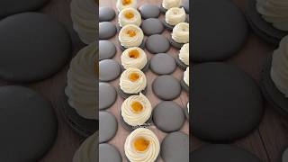 Coconut mango macarons