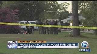 Man's body found in house fire debris