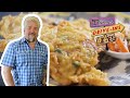 Guy fieri eats some dynamite indonesian tempeh fritters  diners driveins and dives  food network