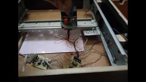 Homemade  DIY CNC Machine 2 axes  made from Printer parts and controlled PC