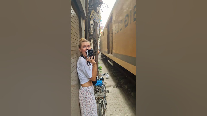 Couple Visit Hanoi's Famous Train Street || ViralHog
