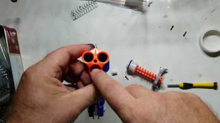 Simple spring replacement for Nerf Triad