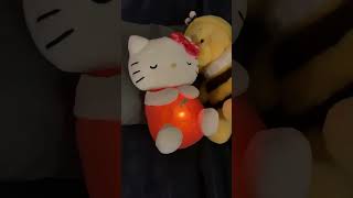 A cute pink & white Hello Kitty plush toy with a light-up belly "breathes".