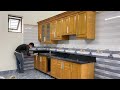 technique of installing large format granite kitchen countertops on a wooden frame